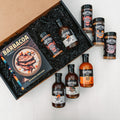 The Cookbook Box open: the signed Barbacoa cookbook, a Hurtado rub and a sauce in the black gift box